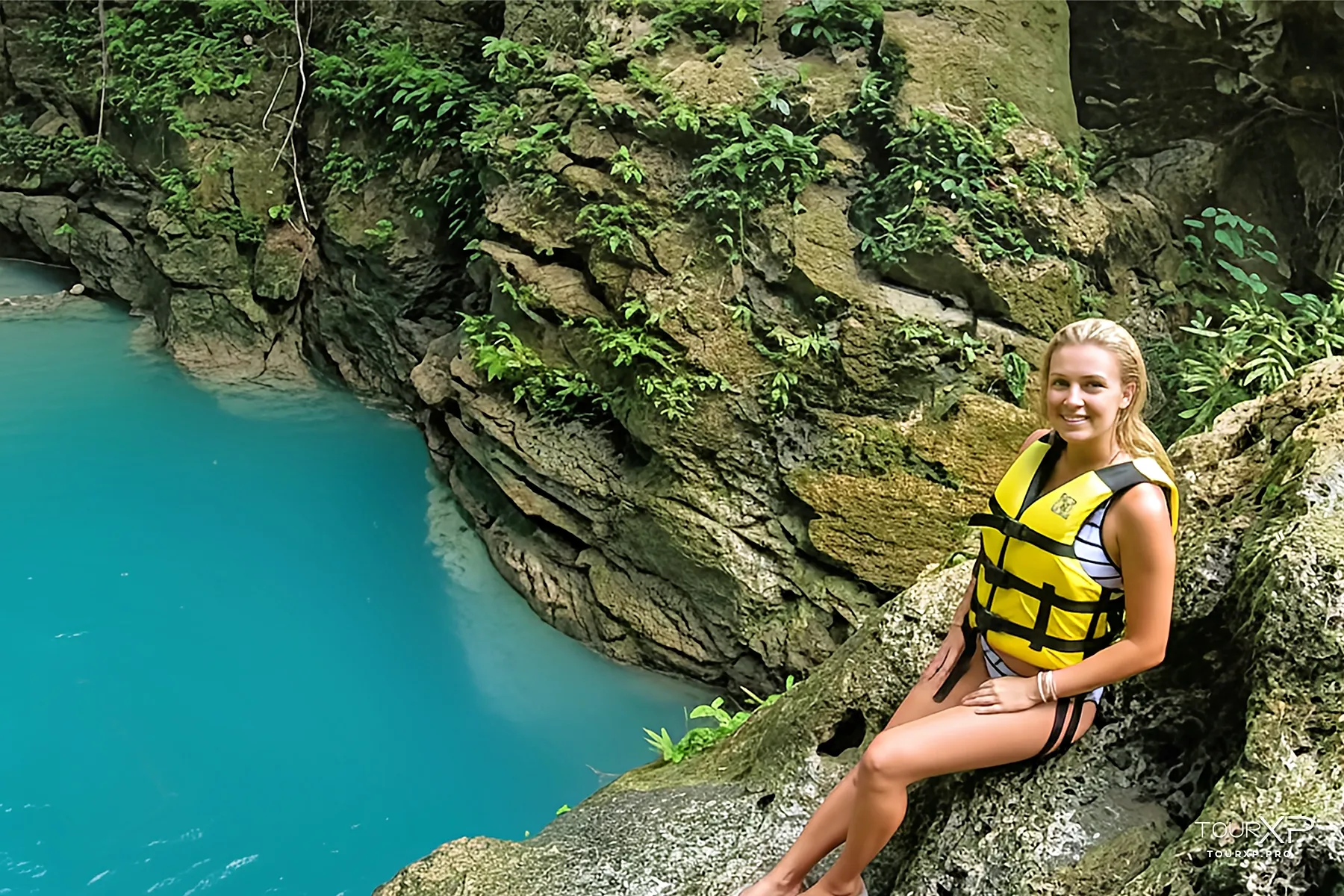 TourXP Canyroneering Day Tour from Dumaguete to Badian Cebu Canyoneering rock slide experience in Badian Cebu